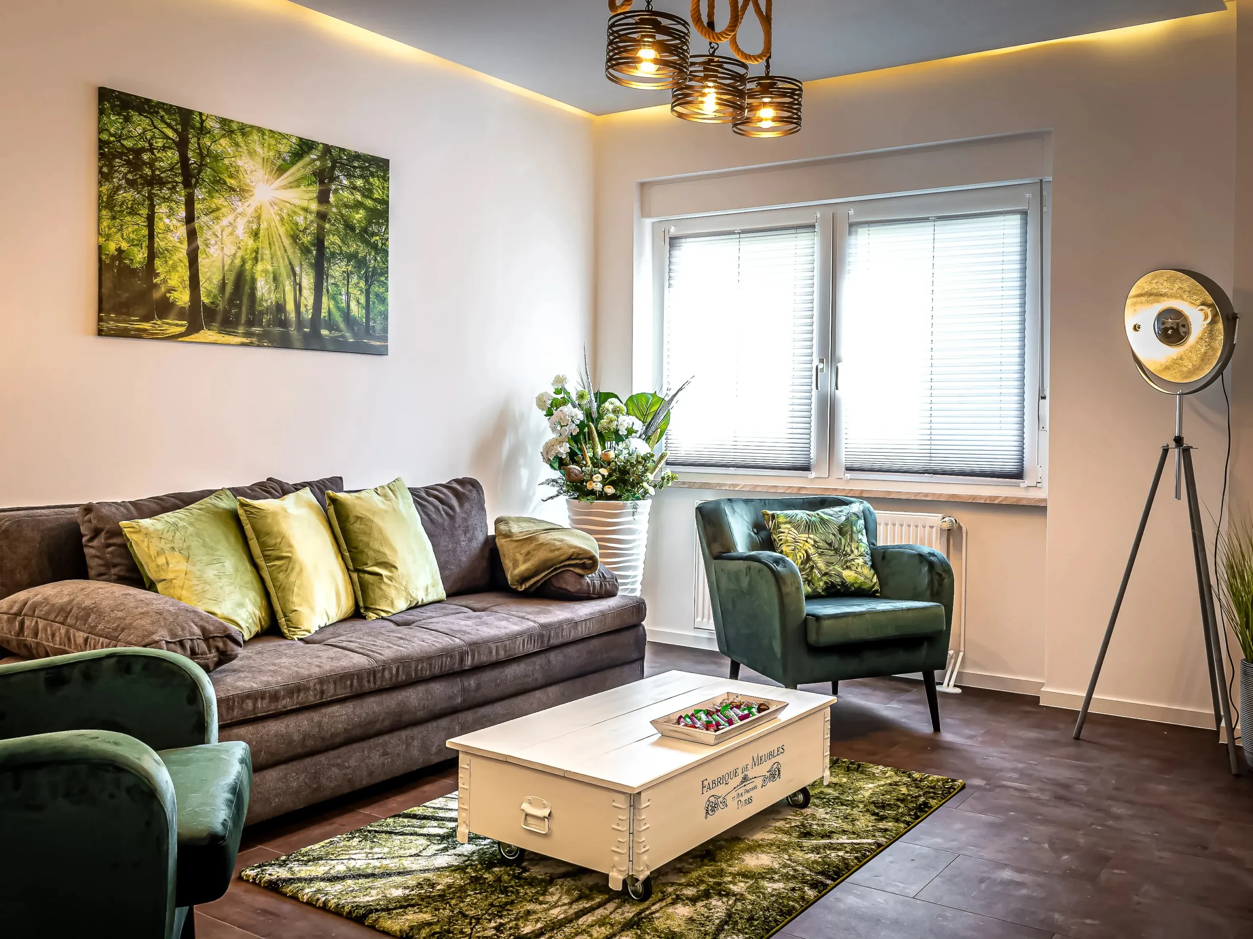 ferienwohnung-wohnzimmer-sofa-sessel-couchtisch